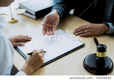 Judge gavel with Justice lawyer having team 54636683