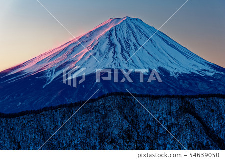 Mt. Fuji in the morning sun as seen from Misaka mountain area and Shakuhigatake 54639050