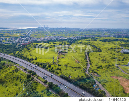 Aerial view of highways and high voltage metal 54640820
