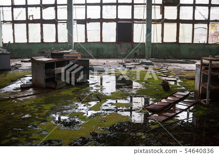 Inside the ruined and abandoned industrial plant 54640836