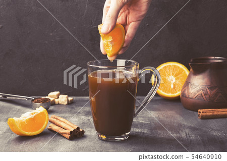 Autumn drink of coffee with orange juice and cream Autumn drink of coffee with orange juice and cream 54640910