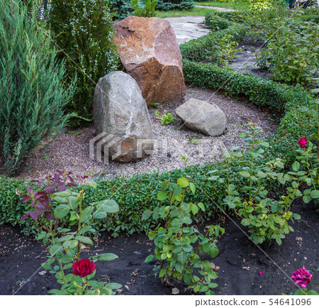 Rockery in the garden. Rockery in the garden. 54641096