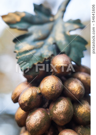 Metal grapes bunch and leaf. Forged ornament. Metal grapes bunch and leaf. Forged ornament. 54641606
