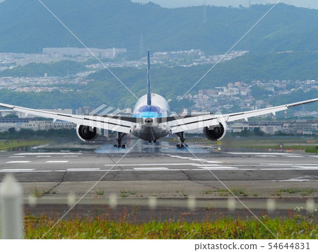Jetliner landing at Osaka International Airport Jetliner landing at Osaka International Airport 54644831