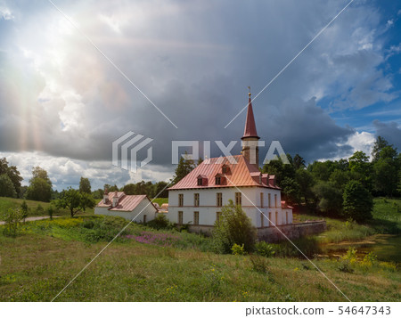 Sunny landscape with old castle. Russia. Gatchina. Sunny landscape with old castle. Russia. Gatchina. 54647343