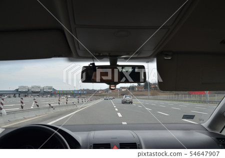 Approaching a pay toll Approaching a pay toll 54647907