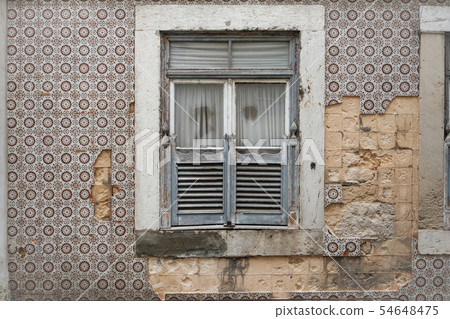 Gray window shutters and grunge wall background 54648475