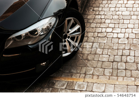 Front part of luxurious black car 54648754