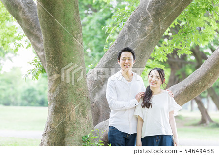 A newlywed couple A newlywed couple 54649438