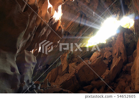 Sun beam in cave 54652605