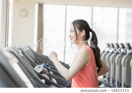 Fitness gym gym gym running machine woman earphones music Fitness gym gym gym running machine woman earphones music 54655323