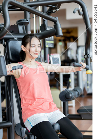 Fitness gym gym woman chest press 54655641