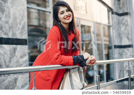 Fashion girl walking in a summer city 54659939