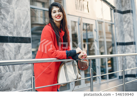 Fashion girl walking in a summer city 54659940