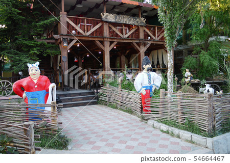 Entrance to the restaurant with heroes of national Entrance to the restaurant with heroes of national 54664467