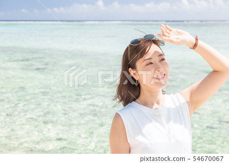 Woman beauty beauty skincare sea sky UV Woman beauty beauty skincare sea sky UV 54670067
