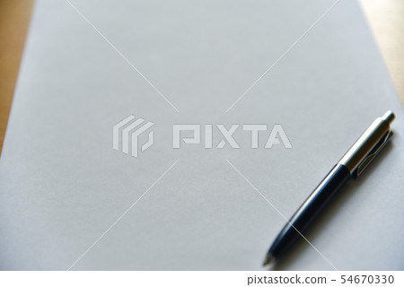 Pen on white paper on the desk in the office Pen on white paper on the desk in the office 54670330