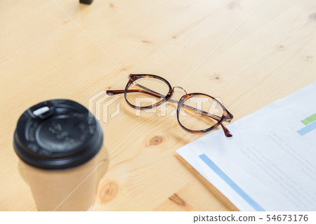 Glasses and documents Glasses and documents 54673176