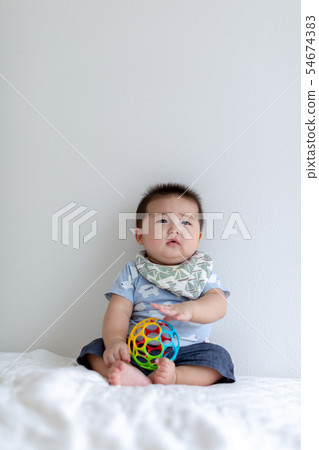 Sitting baby Sitting baby 54674383