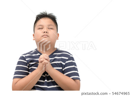 Asian boy praying isolated on white . 54674965