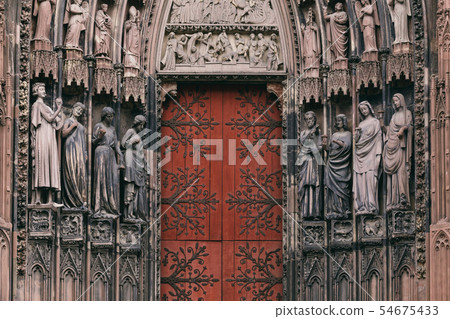 gates and statues of the Cathedral in Strasbourg 54675433
