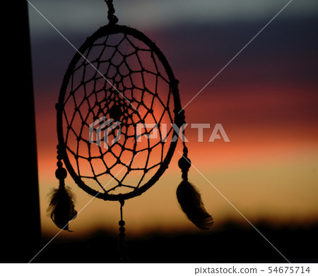 dream catcher on the background of a sunset dream catcher on the background of a sunset 54675714