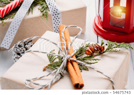 decorations with gift boxes,pine cones and lantern 54675743