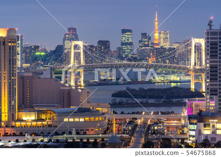 Tokyo tower with rainbow bridge sunset 54675868