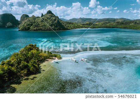 Aerial view of turquoise water and sandbar on tropical Vigan Snake Island, tourist attractions, tour 54676021
