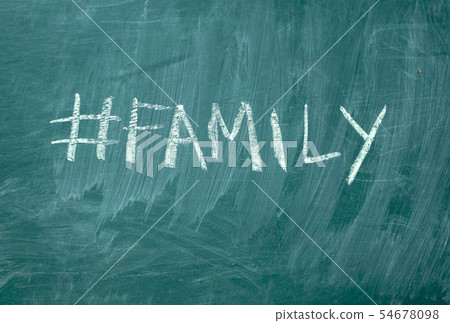 Family hashtag it handwritten with white chalk on Family hashtag it handwritten with white chalk on 54678098