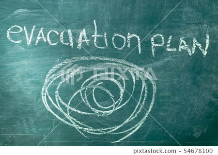 Joking evacuation plan drawn on school blackboard Joking evacuation plan drawn on school blackboard 54678100