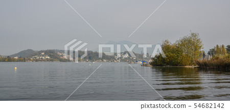A calm morning landscape of lake A calm morning landscape of lake 54682142