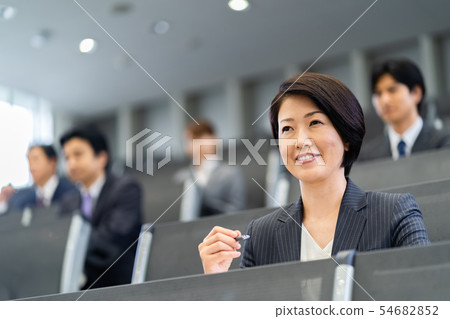 Businessman seminar taking qualification examination qualification examination office casual business scene Businessman seminar taking qualification examination qualification examination office casual business scene 54682852