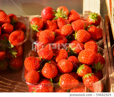 Strawberry fruits for sale at rural market Strawberry fruits for sale at rural market 54682924