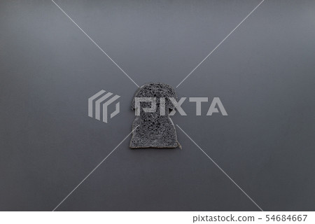 Organic bio charcoal bread on black background Organic bio charcoal bread on black background 54684667