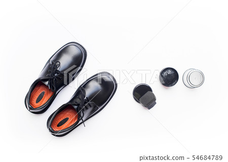 Black leather shoes shoe polish white background Black leather shoes shoe polish white background 54684789