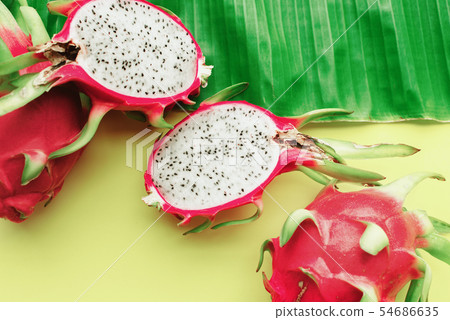 Pitahaya tropical fruits on green background. Raw Pitahaya tropical fruits on green background. Raw 54686635
