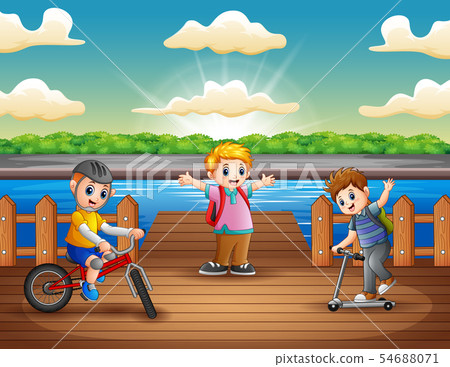 Happy boys playing in the river Happy boys playing in the river 54688071