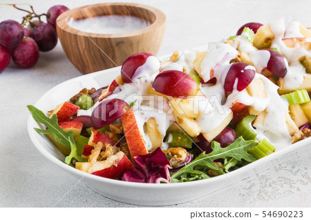 Waldorf salad with apples, celery, grapes, walnuts Waldorf salad with apples, celery, grapes, walnuts 54690223