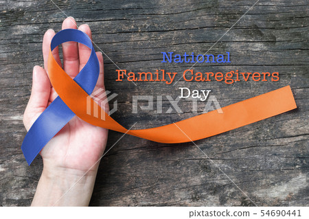 Human rights family caregivers awareness ribbon 54690441