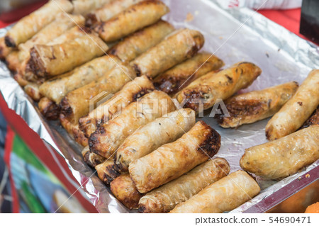 Spring rolls at the market Spring rolls at the market 54690471