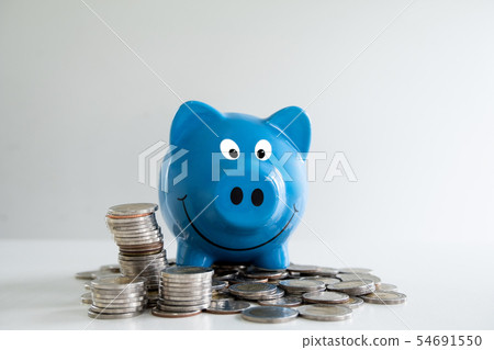 blue piggy bank saving and prevent coins pile 54691550