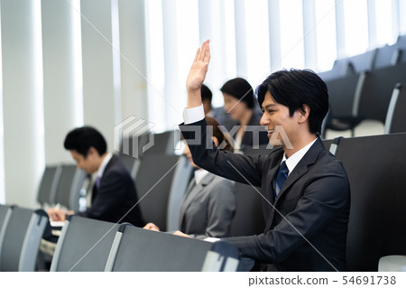 Businessman seminar taking qualification examination qualification examination office casual business scene 54691738