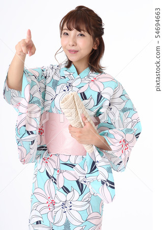 A woman in a yukata A woman in a yukata 54694663