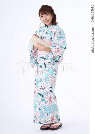 A woman in a yukata A woman in a yukata 54695046