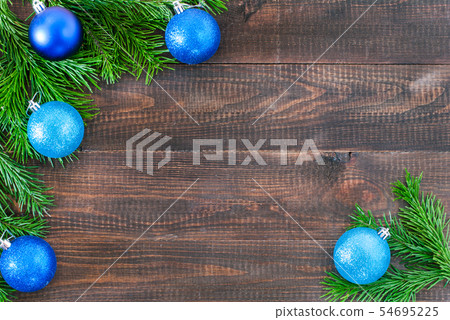 Christmas fir tree with decoration on wooden background 54695225