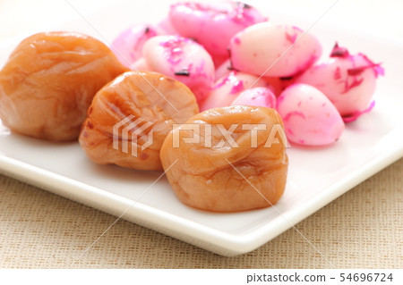 Assorted pickles. Honey plum (seasoned pickled plum) and pickled garlic (shiso bonito). 54696724