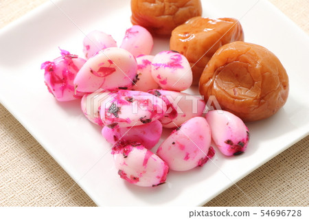 Assorted pickles. Honey plum (seasoned pickled plum) and pickled garlic (shiso bonito). 54696728