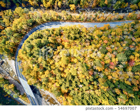 Scenic winding highway in autumn 54697007