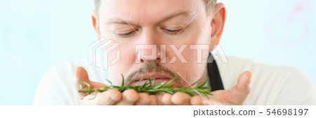 Blogger Beard Chef Smelling Aromatic Rosemary Herb Blogger Beard Chef Smelling Aromatic Rosemary Herb 54698197